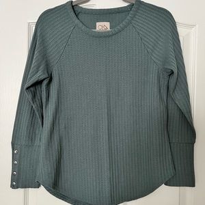 Green long-sleeved shirt